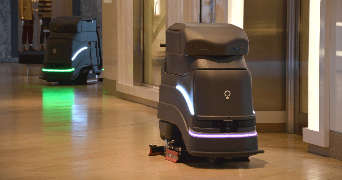What is a commercial floor scrubbing robot?